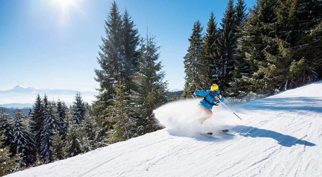 skier slope mountains winter day